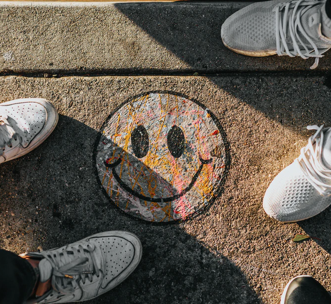 social entrepreneur happy face footwear